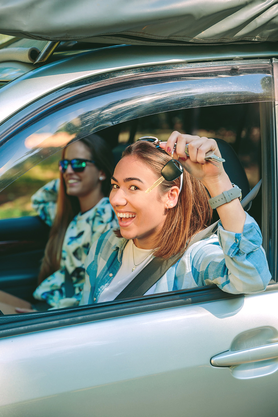 happy-woman-showing-car-keys